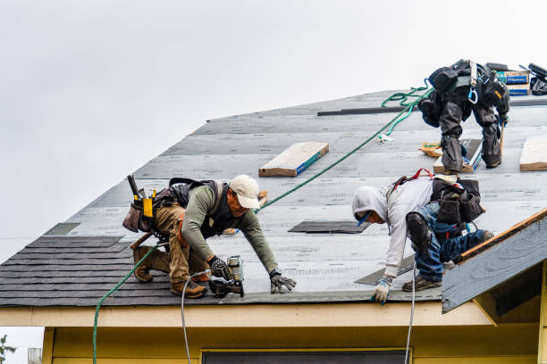 Professional Roofing technician working in Shirley, NY